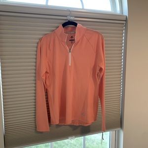 Adidas peach long sleeve, breathable quarter zip golf shirt. Size small, UPF 50